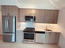 3009-8 Nahani Way, Mississauga, ON  - Indoor Photo Showing Kitchen With Stainless Steel Kitchen 