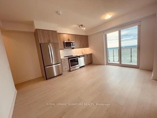 3009-8 Nahani Way, Mississauga, ON - Indoor Photo Showing Kitchen With Stainless Steel Kitchen