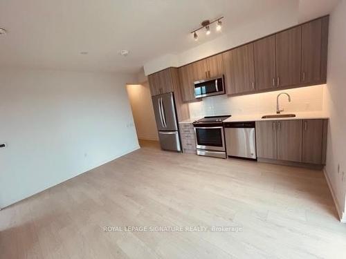 3009-8 Nahani Way, Mississauga, ON - Indoor Photo Showing Kitchen With Stainless Steel Kitchen