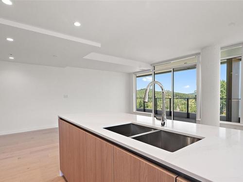 702-2000 Hannington Rd, Langford, BC - Indoor Photo Showing Kitchen With Double Sink