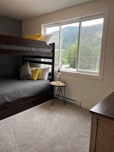 24-1240 Alpine Road, Kamloops, BC - Indoor Photo Showing Bedroom With Fireplace