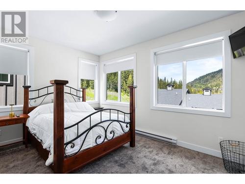 1240 Alpine Road Unit# 60, Sun Peaks, BC - Indoor Photo Showing Bedroom