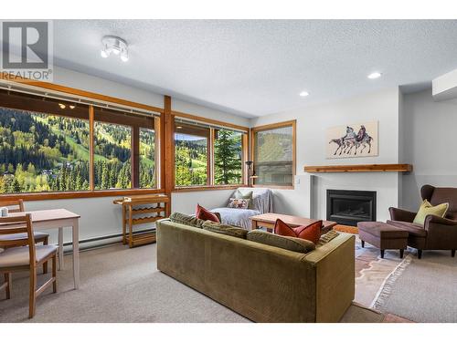 2417 Fairways Drive, Sun Peaks, BC - Indoor Photo Showing Living Room With Fireplace