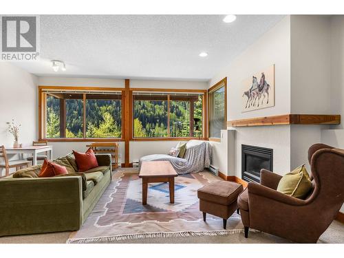 2417 Fairways Drive, Sun Peaks, BC - Indoor Photo Showing Living Room With Fireplace