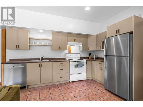 2417 Fairways Drive, Sun Peaks, BC - Indoor Photo Showing Kitchen With Double Sink