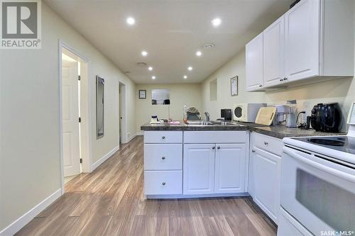 4805 8Th Avenue, Regina, SK - Indoor Photo Showing Kitchen With Double Sink