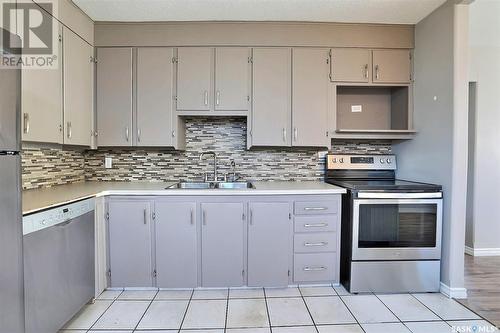 4805 8Th Avenue, Regina, SK - Indoor Photo Showing Kitchen With Double Sink