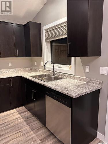 335 Labine Crescent, Saskatoon, SK - Indoor Photo Showing Kitchen With Double Sink