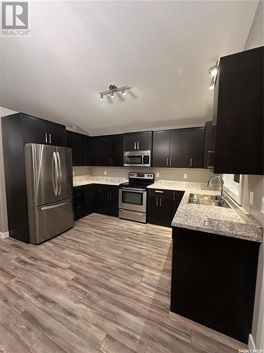 335 Labine Crescent, Saskatoon, SK - Indoor Photo Showing Kitchen With Stainless Steel Kitchen With Double Sink