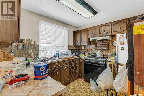 3663 Fairlight Drive, Saskatoon, SK - Indoor Photo Showing Kitchen With Double Sink