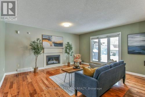 83 Brandy Lane Road, London, ON - Indoor Photo Showing Living Room With Fireplace