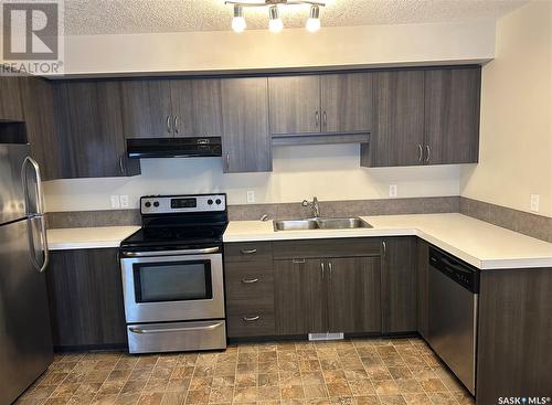 41 5278 Aerodrome Road, Regina, SK - Indoor Photo Showing Kitchen With Stainless Steel Kitchen With Double Sink