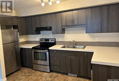 41 5278 Aerodrome Road, Regina, SK - Indoor Photo Showing Kitchen With Stainless Steel Kitchen With Double Sink