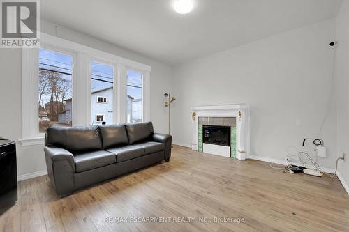 59 Cannon Street W, Hamilton, ON - Indoor Photo Showing Living Room With Fireplace