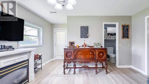 Family Room - 4 Ducharme Crescent, Bluewater (Bayfield), ON - Indoor With Fireplace