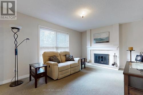 399 The Thicket, Mississauga, ON - Indoor Photo Showing Living Room With Fireplace