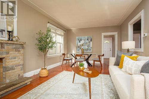 209 Weir Street N, Hamilton, ON - Indoor Photo Showing Living Room With Fireplace