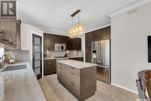 306 Wright Court, Saskatoon, SK - Indoor Photo Showing Kitchen With Double Sink With Upgraded Kitchen