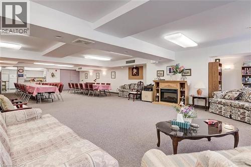 8 Huron Street Unit# 311, Lindsay, ON - Indoor Photo Showing Living Room With Fireplace