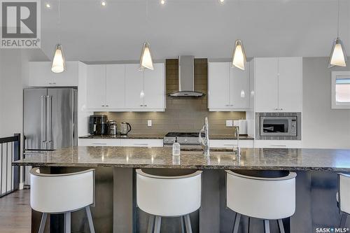 3921 Sandhill Crescent, Regina, SK - Indoor Photo Showing Kitchen With Stainless Steel Kitchen With Double Sink With Upgraded Kitchen