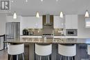 3921 Sandhill Crescent, Regina, SK  - Indoor Photo Showing Kitchen With Stainless Steel Kitchen With Double Sink With Upgraded Kitchen 