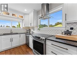 Beautifully updated kitchen with a view. - 