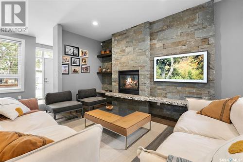 1236 15Th Street E, Saskatoon, SK - Indoor Photo Showing Living Room With Fireplace