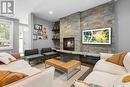 1236 15Th Street E, Saskatoon, SK  - Indoor Photo Showing Living Room With Fireplace 