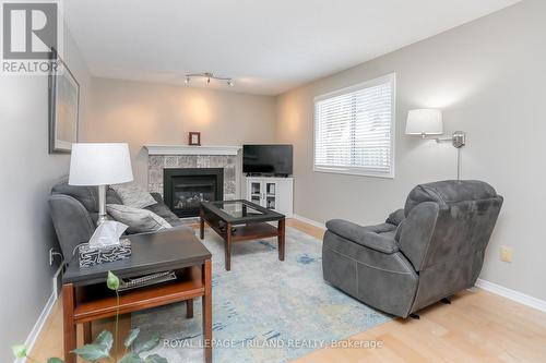 83 Barrydale Crescent, London, ON - Indoor Photo Showing Living Room With Fireplace