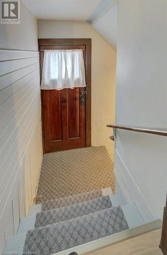 Staircase with lofted ceiling - 97 Peppler Street, Waterloo, ON - Indoor Photo Showing Other Room