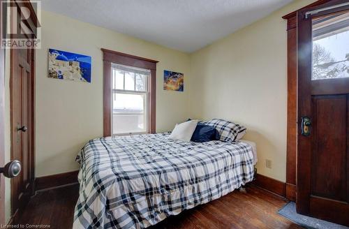 Bedroom with dark wood-type flooring - 97 Peppler Street, Waterloo, ON - Indoor Photo Showing Bedroom