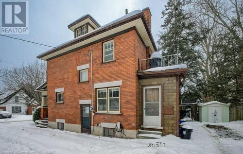 Snow covered property featuring a shed - 97 Peppler Street, Waterloo, ON - Outdoor With Balcony With Exterior