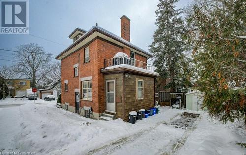 View of snow covered property - 97 Peppler Street, Waterloo, ON - Outdoor With Balcony