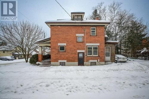 View of snow covered back of property - 97 Peppler Street, Waterloo, ON - Outdoor