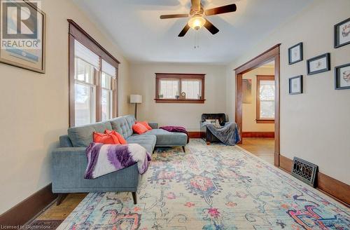 Living room featuring ceiling fan and light hardwood / wood-style floors - 97 Peppler Street, Waterloo, ON - Indoor Photo Showing Living Room