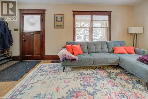 Living room featuring wood-type flooring - 97 Peppler Street, Waterloo, ON - Indoor Photo Showing Living Room