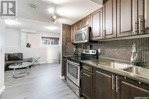 1227 Hargreaves Way, Saskatoon, SK - Indoor Photo Showing Kitchen With Double Sink