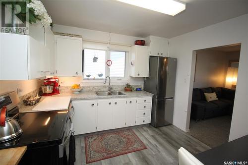 1714 Wilson Crescent, Saskatoon, SK - Indoor Photo Showing Kitchen With Double Sink