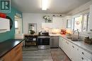 1714 Wilson Crescent, Saskatoon, SK  - Indoor Photo Showing Kitchen With Double Sink 