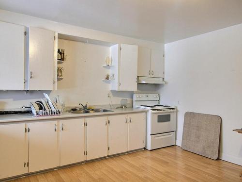 Cuisine - 31  - 35 Rue Perreault E., Rouyn-Noranda, QC - Indoor Photo Showing Kitchen With Double Sink