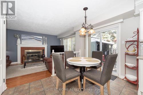 32 Ellisson Way, Ottawa, ON - Indoor Photo Showing Dining Room With Fireplace