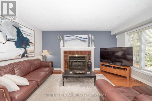 32 Ellisson Way, Ottawa, ON - Indoor Photo Showing Living Room With Fireplace