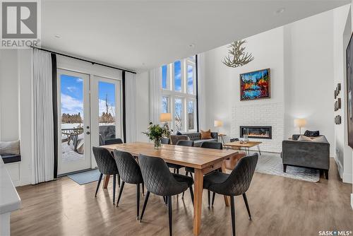 327 Pritchard Crescent, Saskatoon, SK - Indoor Photo Showing Dining Room With Fireplace