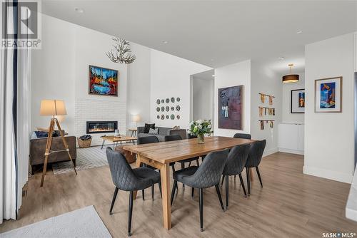 327 Pritchard Crescent, Saskatoon, SK - Indoor Photo Showing Dining Room With Fireplace