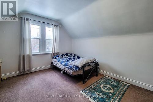 107 Haddon Avenue S, Hamilton, ON - Indoor Photo Showing Bedroom