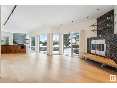 8771 Strathearn Dr Nw, Edmonton, AB - Indoor Photo Showing Living Room With Fireplace