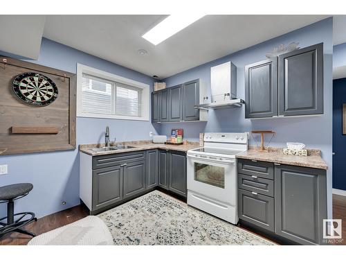 2611 21 Av Nw, Edmonton, AB - Indoor Photo Showing Kitchen With Double Sink