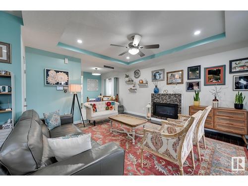 2611 21 Av Nw, Edmonton, AB - Indoor Photo Showing Living Room With Fireplace