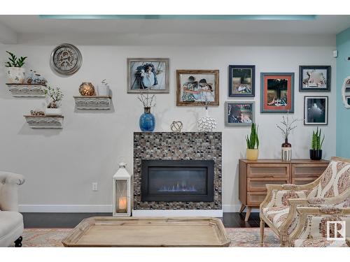 2611 21 Av Nw, Edmonton, AB - Indoor Photo Showing Living Room With Fireplace