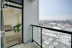 View of snow covered back of property - 